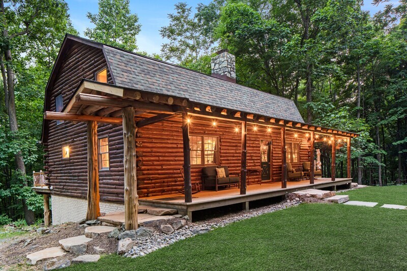 The front porch was extended to the site to make the entry more visible from the downhill approach to the home.